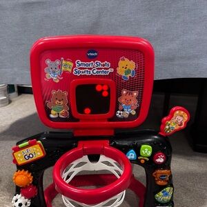 Smart Shots Sports Center - Red and Black